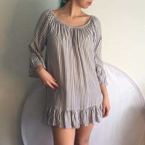 Top or dress off the shoulder or up bell sleeves and cute drop ruffle hem